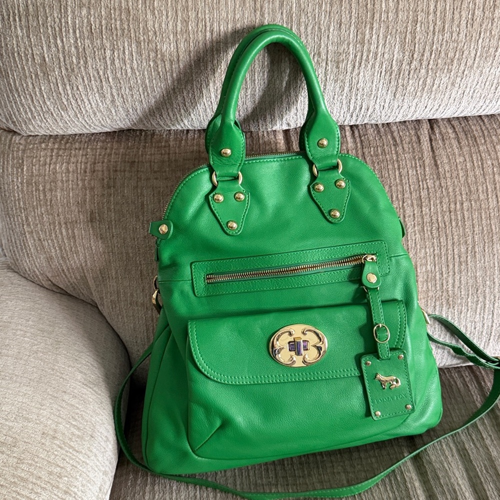 Emma Fox Green leather and Gold Accents zipper , adjustable /removable strap,